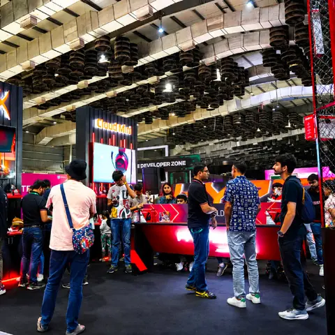 The GamingCon expo hall with booths and visitors