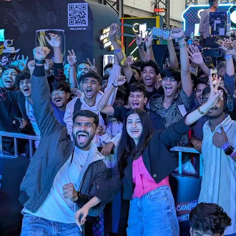 A cheering crowd at a gaming convention stage